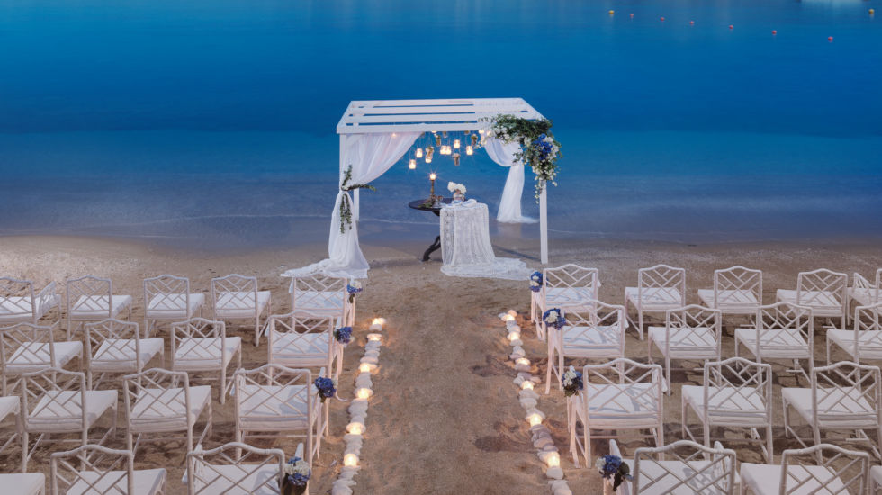 Out of the Blue Resort - Beach wedding ceremony